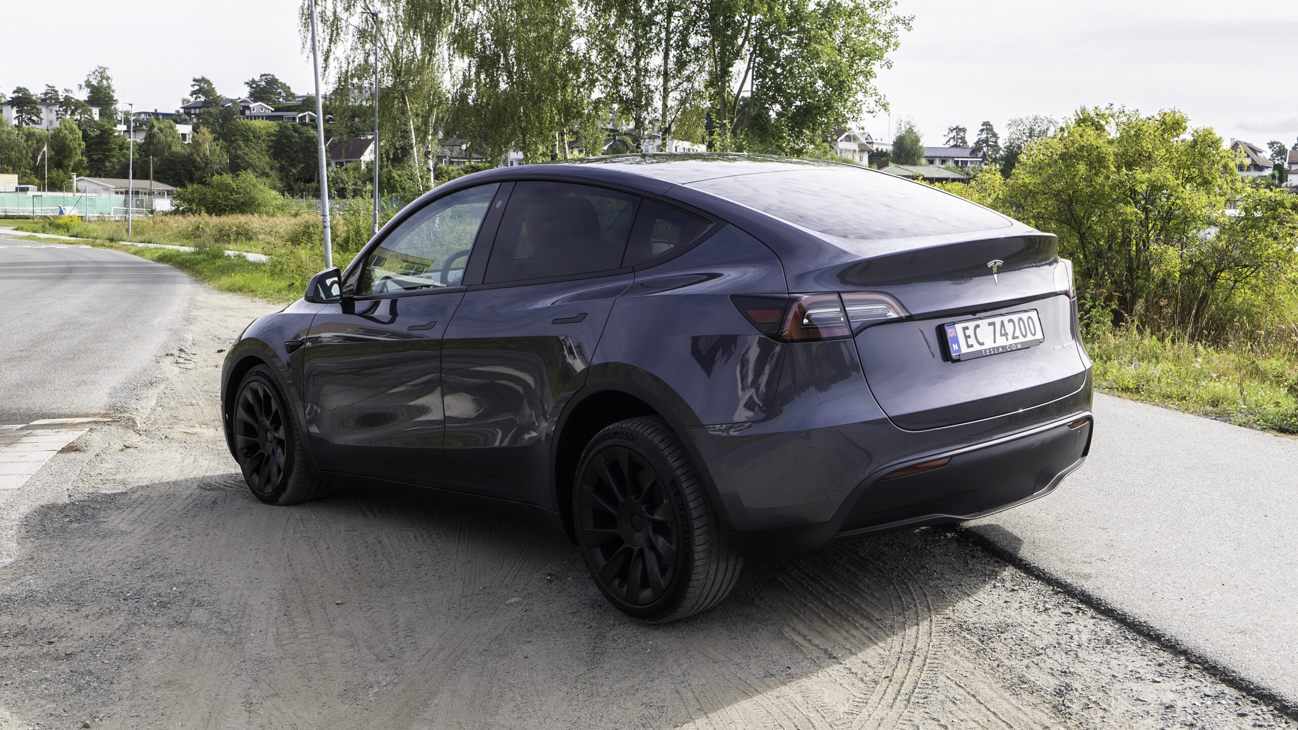 Tesla Model Y spread SharpenAI Softness