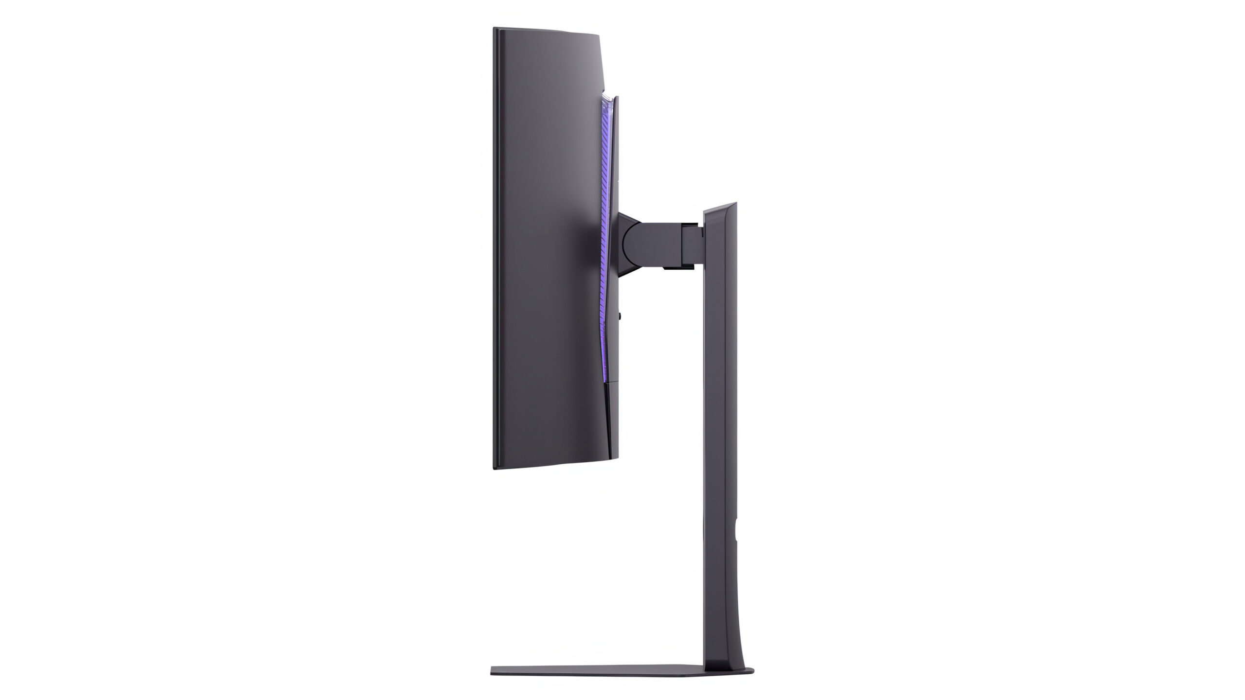 LG GX9: 5K og 330 Hz i samme skjerm 3 Sideprofil av LG UltraGear evo GX9 på stativ, mot hvit bakgrunn. Den moderate kurvaturen vises tydelig fra siden, og en lilla RGB-lysstripe lyser langs baksiden av panelet.